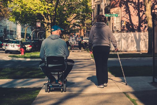 two old people going for a walk